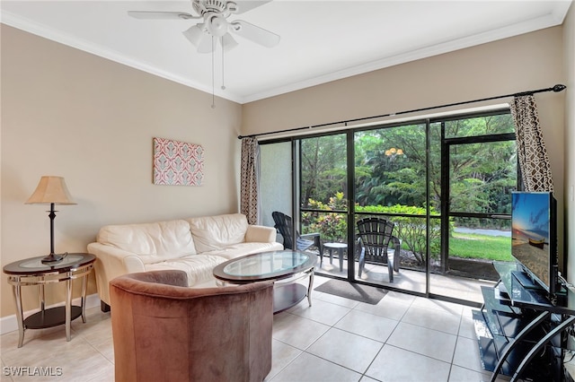 tiled living room featuring ornamental molding, ceiling fan, and a wealth of natural light