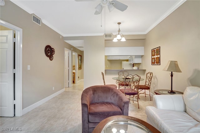 living room with ornamental molding, ceiling fan with notable chandelier, and light tile patterned floors