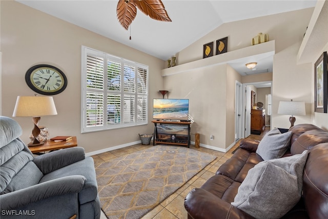 living room featuring tile patterned floors and vaulted ceiling