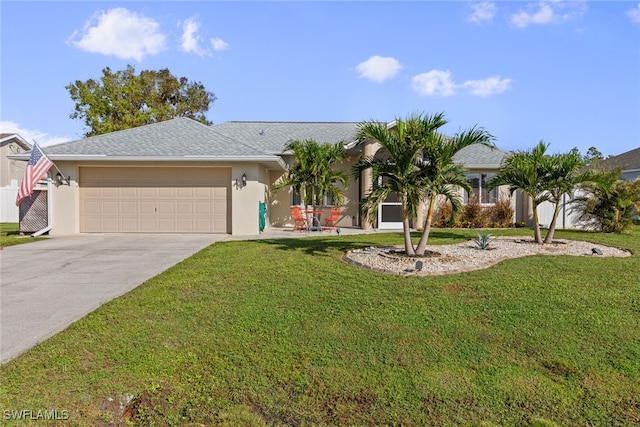 single story home featuring a garage and a front lawn