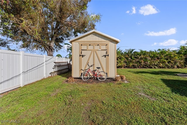 view of outdoor structure with a yard