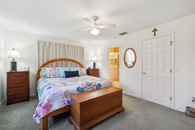 bedroom featuring carpet flooring, ceiling fan, and ensuite bathroom