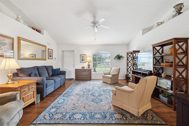 living room with dark wood-type flooring, lofted ceiling, and ceiling fan