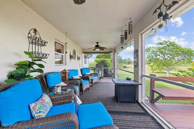 view of patio featuring ceiling fan