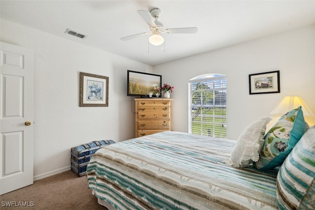 carpeted bedroom with ceiling fan