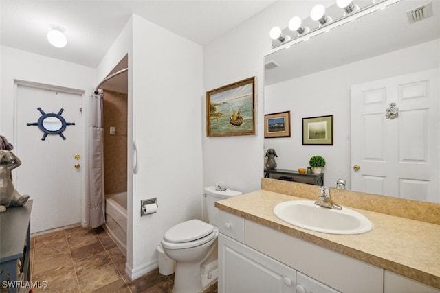 full bathroom with shower / tub combo with curtain, vanity, and toilet