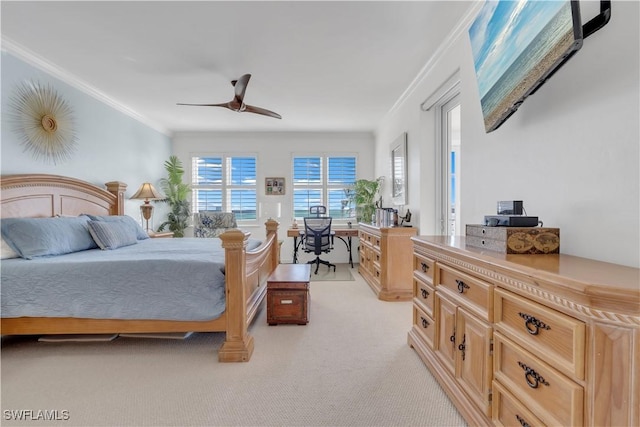 bedroom with ceiling fan, ornamental molding, and light carpet