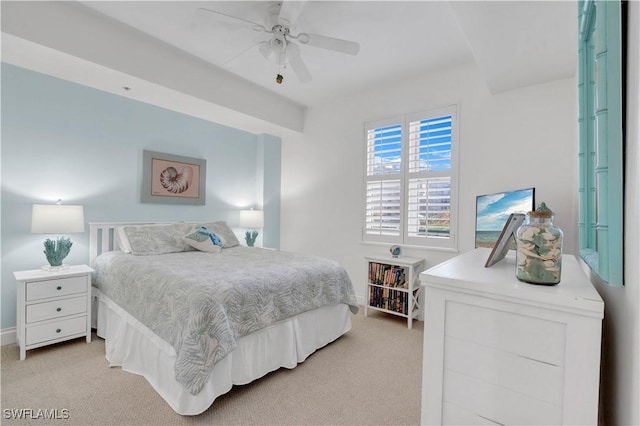 bedroom featuring ceiling fan and light colored carpet