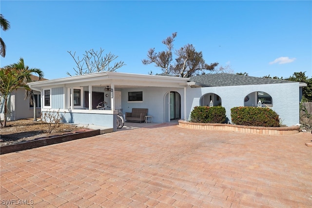 435 Donora Blvd, Fort Myers Beach, FL 33931 - single story home featuring stucco siding and decorative driveway
