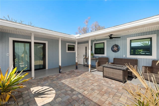 435 Donora Blvd, Fort Myers Beach, FL 33931 - view of patio featuring a ceiling fan and outdoor lounge area