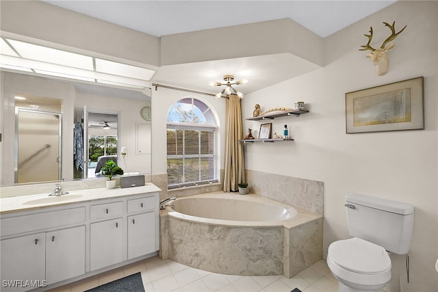 full bathroom featuring toilet, shower with separate bathtub, vanity, and tile patterned flooring