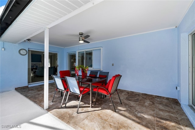 view of patio / terrace featuring ceiling fan