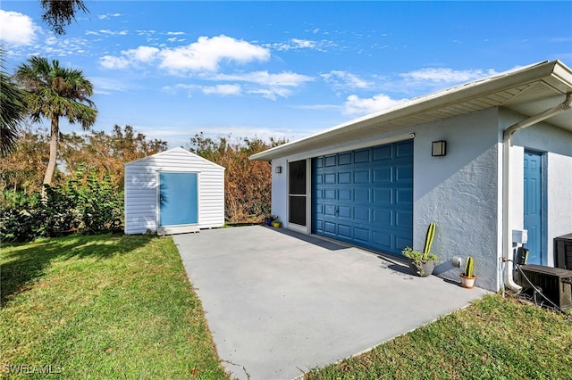 garage with a yard