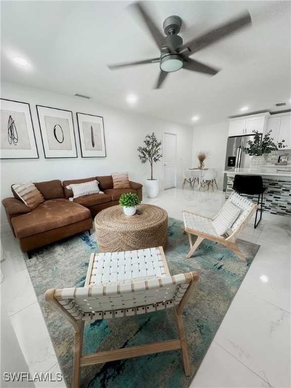 living room featuring ceiling fan