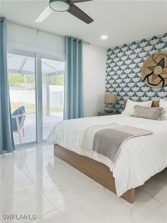 bedroom featuring ceiling fan and access to outside