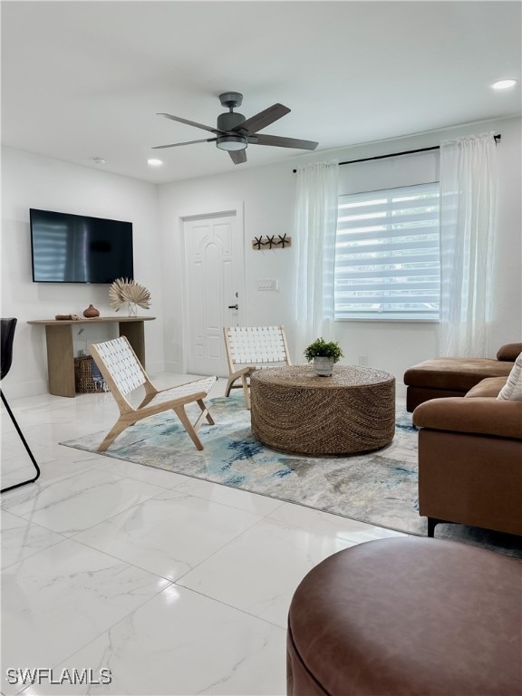 living room with ceiling fan