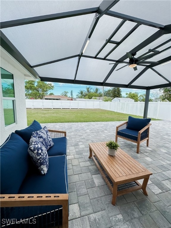 view of patio featuring a pergola and ceiling fan