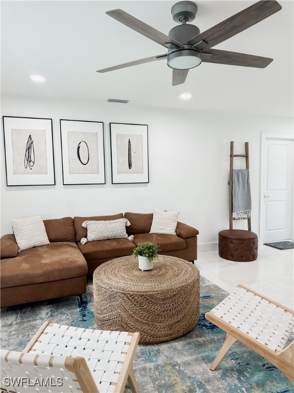 living room with ceiling fan