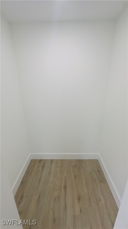 spare room with light wood-type flooring