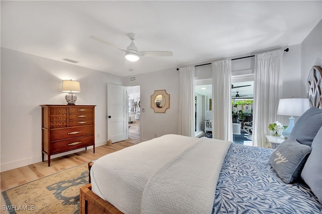 bedroom featuring light hardwood / wood-style flooring, access to exterior, and ceiling fan