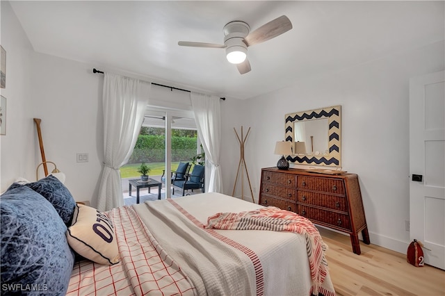 bedroom with ceiling fan, hardwood / wood-style flooring, and access to exterior