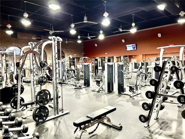 gym featuring a high ceiling