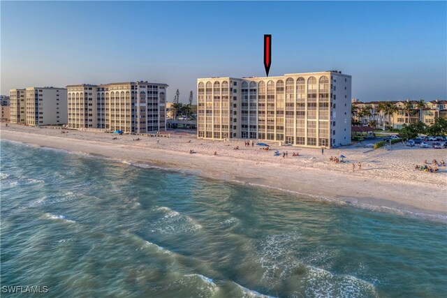 property view of water featuring a beach view