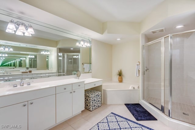 bathroom featuring vanity, separate shower and tub, and tile patterned flooring