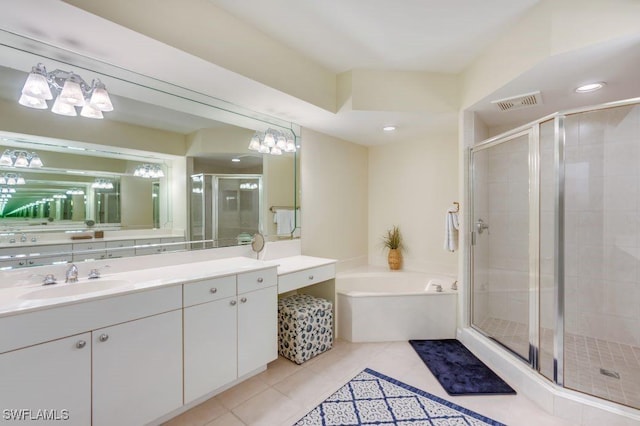 full bathroom with visible vents, tile patterned floors, a garden tub, vanity, and a shower stall