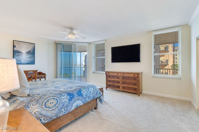 bedroom with crown molding, carpet floors, and ceiling fan