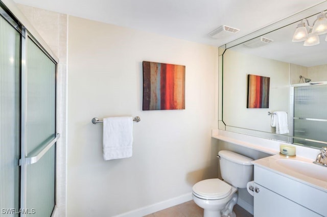 bathroom featuring visible vents, baseboards, toilet, vanity, and a shower stall