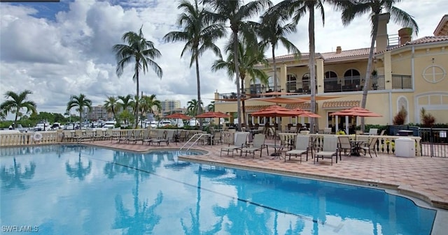 pool with a patio