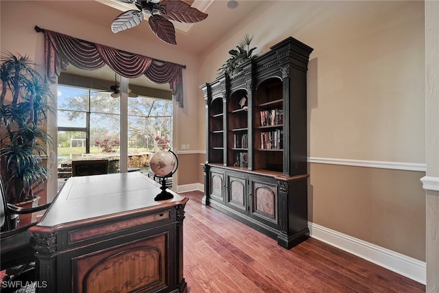 office space featuring lofted ceiling, hardwood / wood-style flooring, and ceiling fan