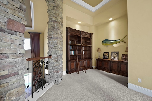 interior space with a high ceiling and ornate columns