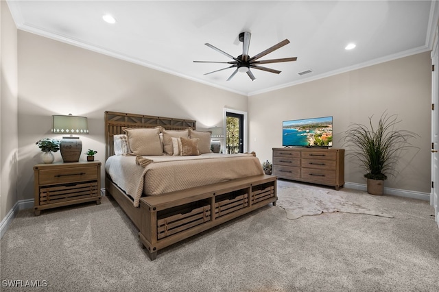 carpeted bedroom with ceiling fan and crown molding