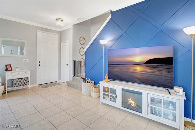 unfurnished living room featuring crown molding and tile patterned floors