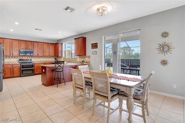 view of tiled dining room