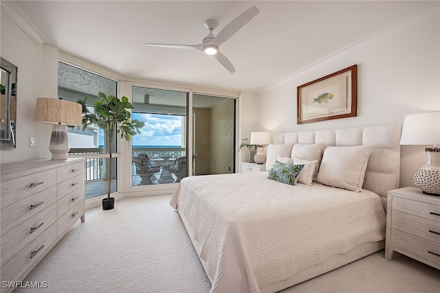 carpeted bedroom with ceiling fan and crown molding