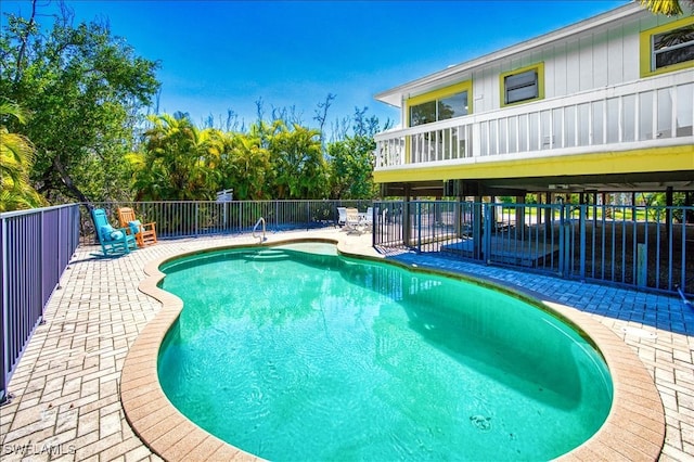 view of pool with a patio area