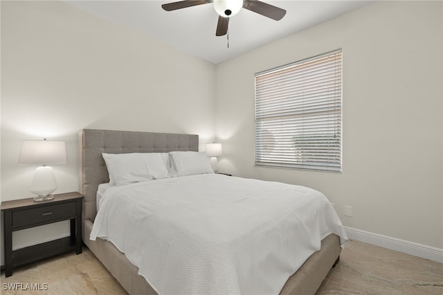 bedroom featuring ceiling fan