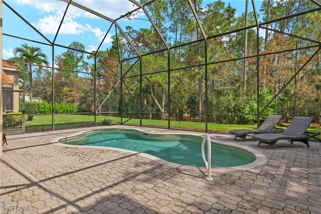 view of pool featuring a lanai and a patio area