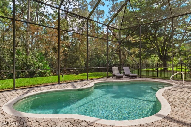 view of swimming pool with a patio