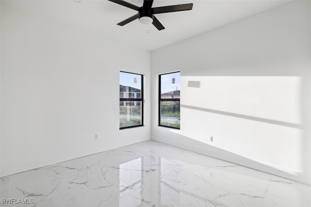 unfurnished room with ceiling fan