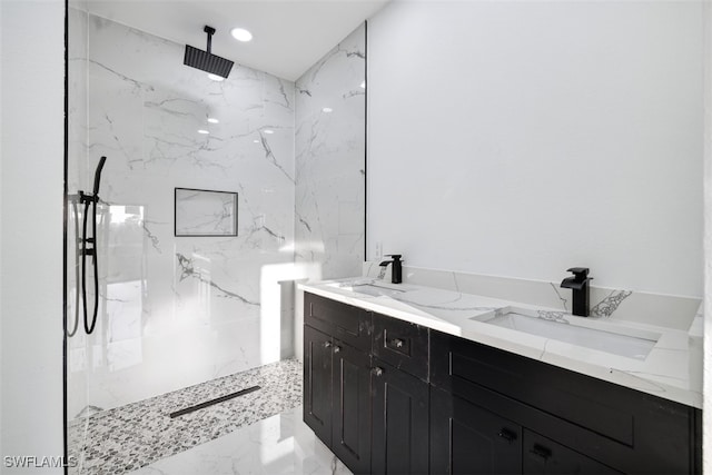 bathroom featuring vanity and a tile shower