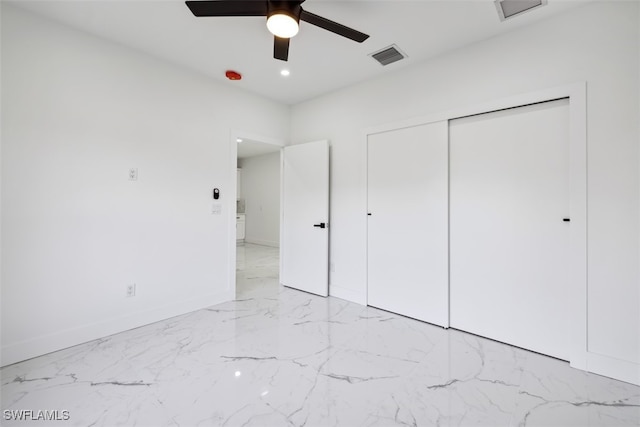 unfurnished bedroom with a closet and ceiling fan