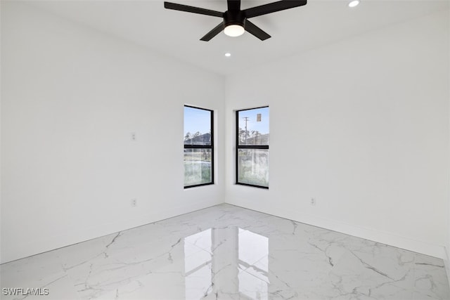 empty room featuring ceiling fan