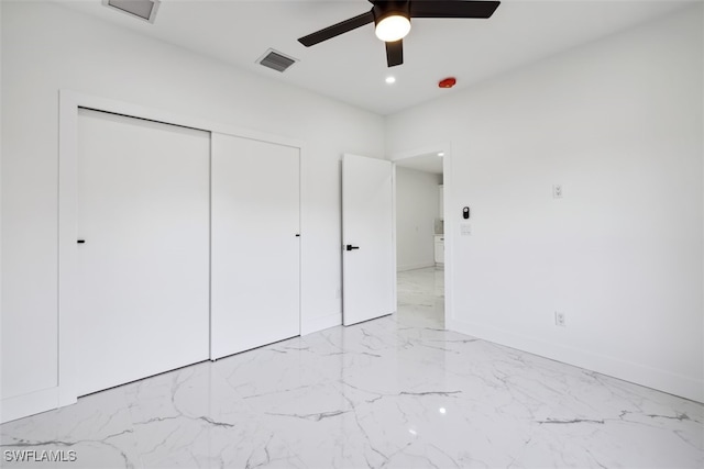 unfurnished bedroom with a closet and ceiling fan