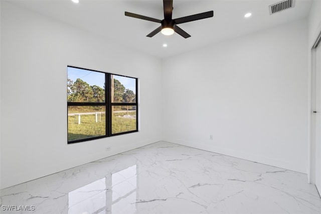 empty room featuring ceiling fan