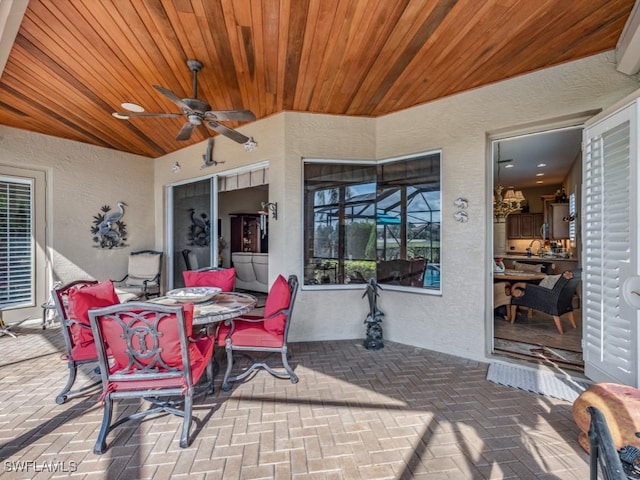 view of patio / terrace featuring ceiling fan