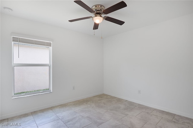 unfurnished room with ceiling fan